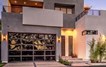 Contemporary Black Aluminum & Black Laminate (Privacy) Glass Garage Door