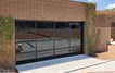 Contemporary Black Aluminum & Black Laminate (Privacy) Glass Garage Door