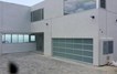 Contemporary Aluminum & White Laminate (Privacy) Glass Garage Door